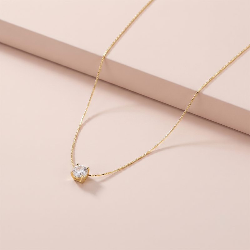 Colar dourado com pingente – foto principal Colar ponto de luz com zircônia banhado a ouro 18k