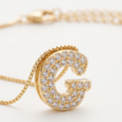 Colar letra G com zircônias banhado a ouro 18k hipoalergênico com acabamento delicado.