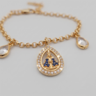 Pulseira Nossa Senhora Aparecida com zircônias transparentes e azuis banho ouro 18k hipoalergênica