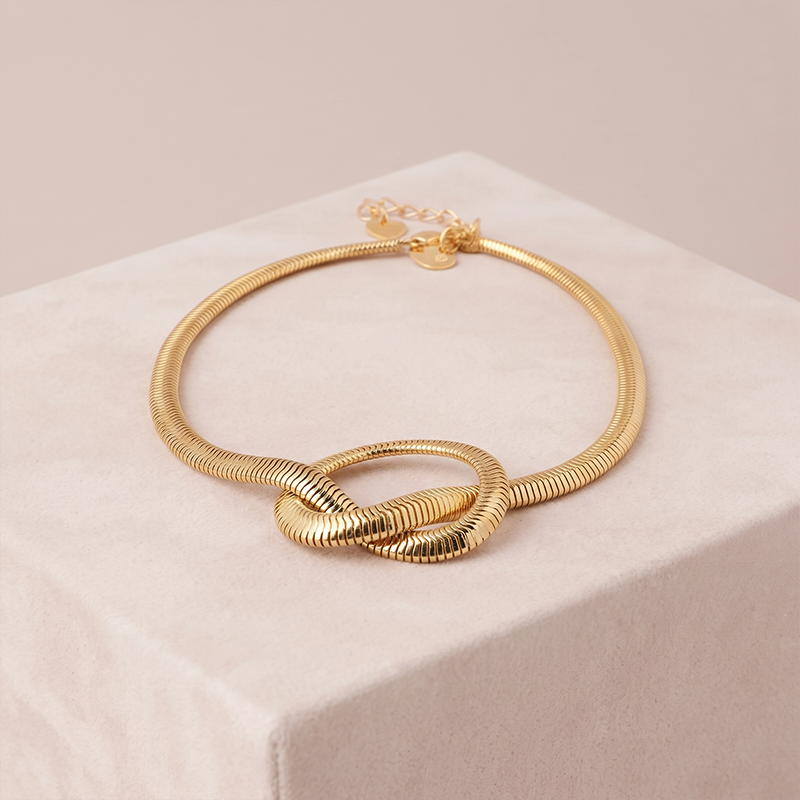 Pulseira nó em malha banho ouro 18k Pulseira nó em malha banho ouro 18k hipoalergênica